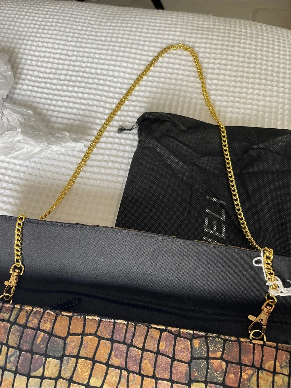 Reptile-Textured Fold Clutch in Brown and Gold